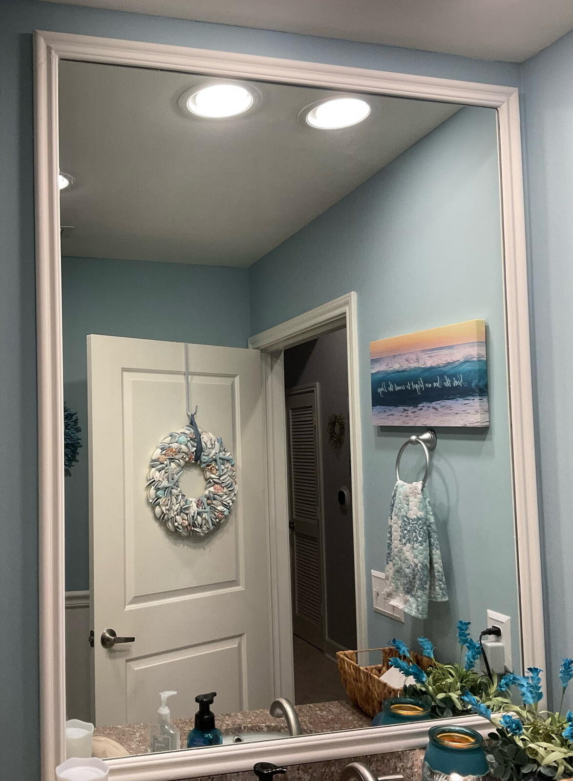 Freshly painted bathroom walls, trim, and interior door