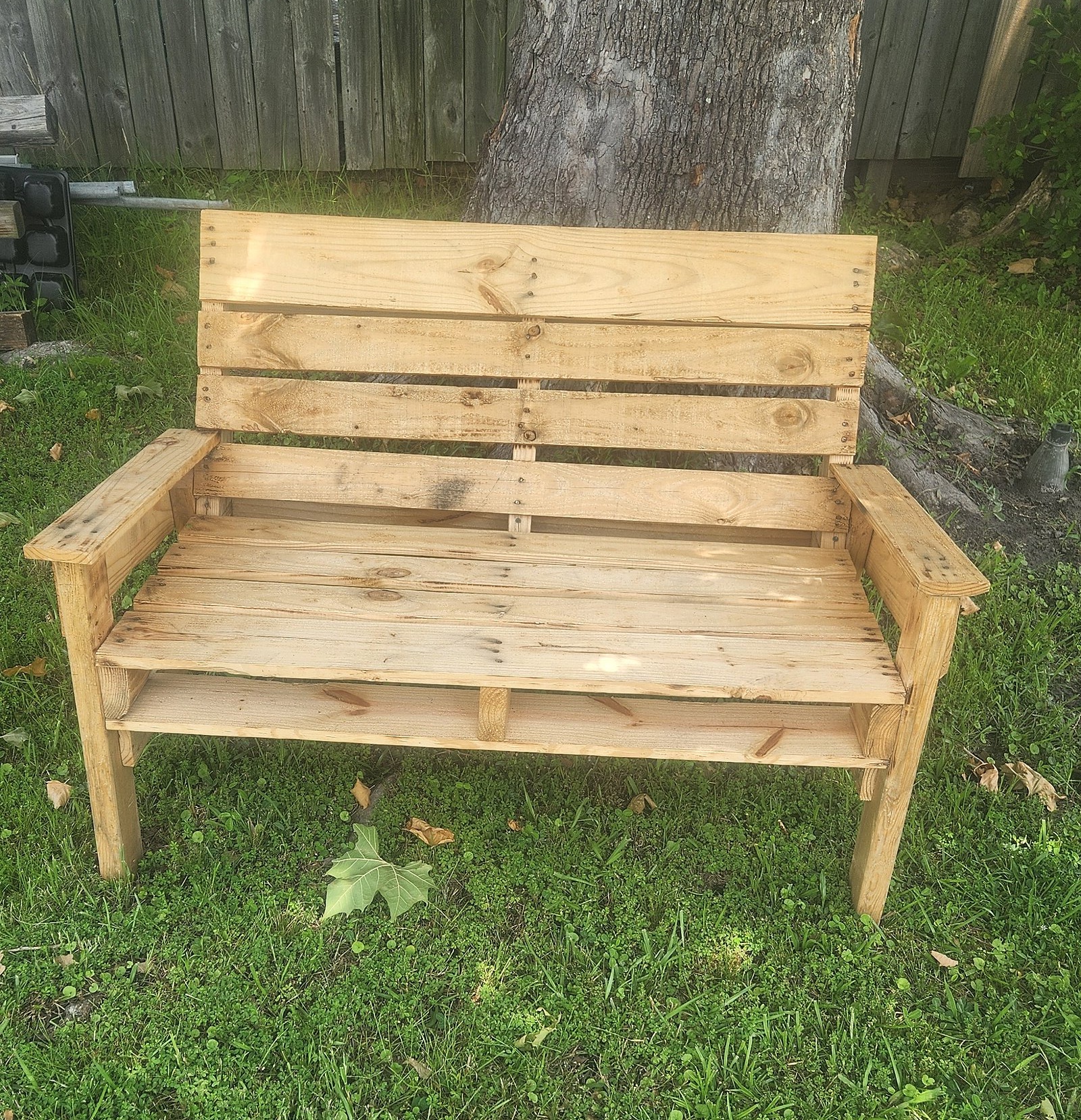 Sturdy wooden love seat bench built from recycled pallet timber
