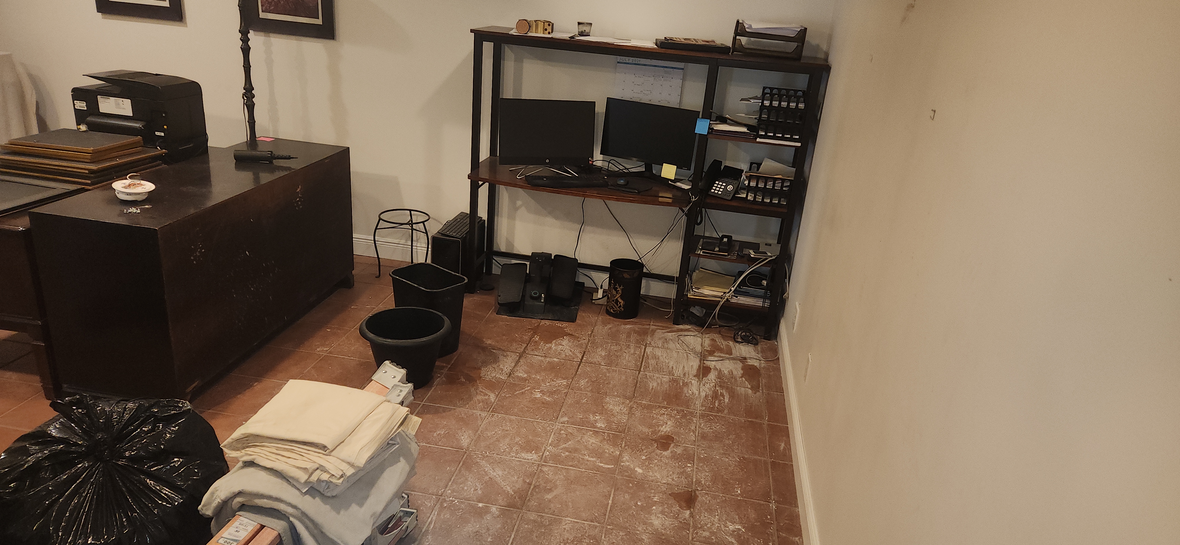 Interior water stain from leaking roof area