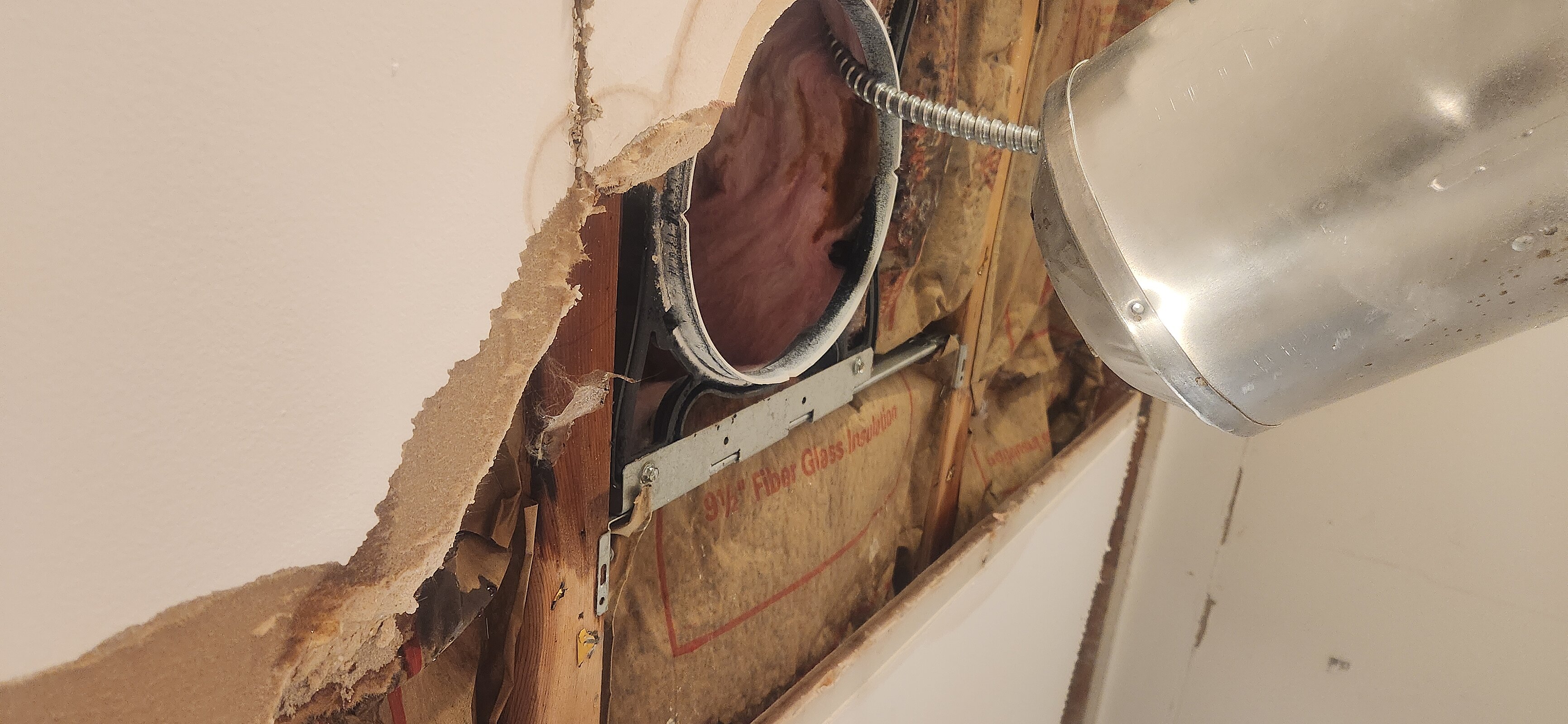 Ceiling moisture damage from active roof leak