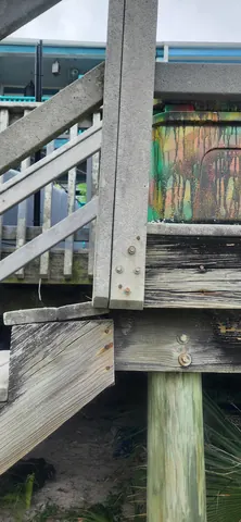 Securing wooden treads and risers for outdoor beach walkway repair