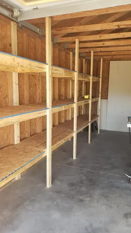 Fitting heavy duty storage planks to garage wall anchors