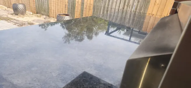 Smooth edge beveling and stone polish on restored granite slab