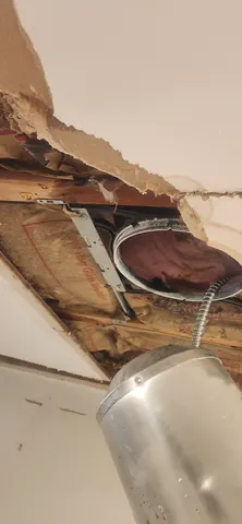 Ceiling moisture damage from active roof leak